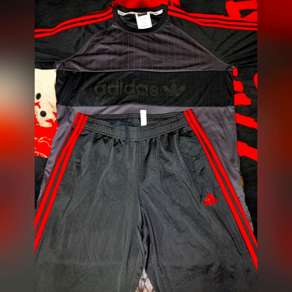 Pre-owned Adidas track suit in Black/Red, with padded sleeves near the forearm..